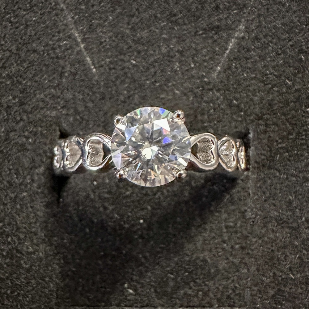 Elegant Size 6 Silver Ring with Heart Accents